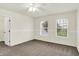 Minimalist bedroom with neutral walls, carpet, a fan, and lots of light at 794 Princeton Ln, Westfield, IN 46074