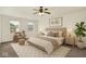Well-lit bedroom featuring a ceiling fan, plush rug, and neutral decor at 794 Princeton Ln, Westfield, IN 46074