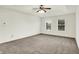 Spacious bedroom with ceiling fan and natural light streaming through the windows at 794 Princeton Ln, Westfield, IN 46074