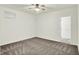 Bedroom featuring plush carpet, a ceiling fan, and a bright window for a serene retreat at 794 Princeton Ln, Westfield, IN 46074