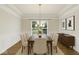 Elegant dining room with tray ceilings, natural light, and modern decor at 794 Princeton Ln, Westfield, IN 46074