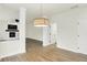 Bright and airy living room featuring hardwood floors and a stylish fireplace at 794 Princeton Ln, Westfield, IN 46074