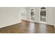 Bright living room with hardwood floors, arched windows, and views of the entry at 794 Princeton Ln, Westfield, IN 46074