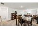 Finished basement with a dining table, built-in shelving and walkout to stairs at 17871 Paula, Westfield, IN 46074