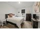 Cozy bedroom with dark wood furniture and neutral decor, providing a relaxing atmosphere at 17871 Paula, Westfield, IN 46074