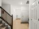 Hallway with wood floors, a staircase on the left, and doors to the side rooms at 17871 Paula, Westfield, IN 46074