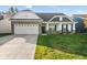 Charming single-Gathering home showcasing a manicured lawn, two-car garage, and welcoming front porch at 17871 Paula, Westfield, IN 46074
