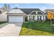 Charming single-Gathering home with a well-manicured lawn and attached garage at 17871 Paula, Westfield, IN 46074