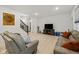 Bright living area featuring two couches, a television, and a staircase at 17871 Paula, Westfield, IN 46074