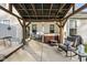 Covered patio featuring a hot tub, comfortable seating, and plenty of room to relax at 17871 Paula, Westfield, IN 46074