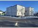 Modern three-story townhomes under construction on a corner lot at 251 N Temple Ave, Indianapolis, IN 46201