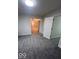 Spacious bedroom with natural lighting and access to other rooms at 6362 Harmonridge Ct, Indianapolis, IN 46278