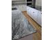 Close-up of a countertop with a modern sink and white cabinets in the background at 6362 Harmonridge Ct, Indianapolis, IN 46278