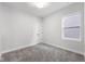 Empty bedroom with grey carpet and a window at 804 James William Ln, Westfield, IN 46074