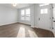 Bright entryway with hardwood floors and a white door at 804 James William Ln, Westfield, IN 46074