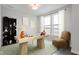 Stylish home office featuring a large desk and built-in shelving at 804 James William Ln, Westfield, IN 46074