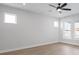 Bright bedroom with hardwood floors and large windows at 804 James William Ln, Westfield, IN 46074