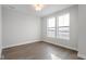 Spacious bedroom with hardwood floors and large windows at 804 James William Ln, Westfield, IN 46074
