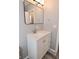 Bathroom features modern vanity, gray paint, and contemporary fixtures at 1709 Hoyt Ave, Indianapolis, IN 46203