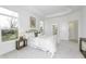 Spacious bedroom features soft neutral colors, tray ceiling, carpet, and large windows, creating a cozy and inviting atmosphere at 2639 Collins Dr, Westfield, IN 46074