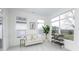 Bright sitting room with comfortable seating, large windows providing natural light, and views of the landscape at 2639 Collins Dr, Westfield, IN 46074