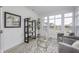 Sunroom features lots of windows, neutral decor, and a view of neighboring homes at 2639 Collins Dr, Westfield, IN 46074