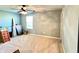 This bedroom features neutral colored walls, carpet and a ceiling fan for climate control at 5778 W Commonview Dr, McCordsville, IN 46055