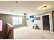 This loft features carpet flooring, natural light from a window and recessed lighting at 5778 W Commonview Dr, McCordsville, IN 46055