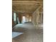 Under construction home's open interior framing and flooring at 1924 N Lesley Ave, Indianapolis, IN 46218