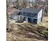 Two story home features a well-maintained yard and a classic, welcoming facade at 839 Fernwood Ct, Indianapolis, IN 46234