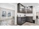 Stylish kitchen with granite countertops and dark wood cabinetry at 839 Fernwood Ct, Indianapolis, IN 46234