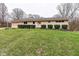 Charming single-story home with an attached garage and well-maintained lawn at 104 Mohawk Ln, West Lafayette, IN 47906