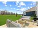 Spacious backyard features a patio with outdoor furniture, great for enjoying the outdoors at 1775 Beyers St, Fortville, IN 46040