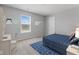 This cozy bedroom features an area for school work and modern decor at 1775 Beyers St, Fortville, IN 46040