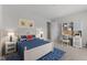 Cozy bedroom featuring a bed, desk, and stylish nautical-themed decor for a comfortable space at 1775 Beyers St, Fortville, IN 46040