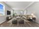 Spacious living room featuring stylish seating, hard wood floors and lots of light at 1775 Beyers St, Fortville, IN 46040