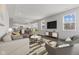 Spacious living room featuring an open-concept layout, hardwood floors, and recessed lighting at 1775 Beyers St, Fortville, IN 46040