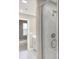 Bright shower with tile surround and chrome fixtures, the ensuite bath features double sinks and granite counters at 18322 Depoe Ln, Westfield, IN 46074