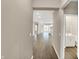 Spacious hallway leading to an open-concept living area with a powder room at 18322 Depoe Ln, Westfield, IN 46074