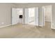 Spacious main bedroom with plush carpeting, ensuite bathroom and walk-in closet at 18322 Depoe Ln, Westfield, IN 46074
