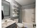 Bathroom with shelves, toilet, shower, and vanity sink with faucet at 104 W County Road 500 S, Clayton, IN 46118
