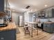 A spacious kitchen featuring gray cabinets, butcher block countertops, and stainless steel appliances at 104 W County Road 500 S, Clayton, IN 46118