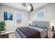 Serene bedroom with a comfortable bed, soft lighting, and stylish decor at 1829 New St, Indianapolis, IN 46203
