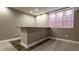 Finished basement bar with granite countertop and stylish cabinetry at 2016 Central Ave, Indianapolis, IN 46202