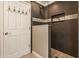 Modern shower with glass enclosure and dark brown tiles at 2016 Central Ave, Indianapolis, IN 46202