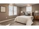 Cozy bedroom with a double bed, two nightstands, and window blinds at 2016 Central Ave, Indianapolis, IN 46202