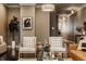 Living area with two armchairs, a coffee table, and a stylish rug at 2016 Central Ave, Indianapolis, IN 46202