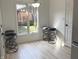 Bright breakfast nook with a large window and bar stool seating at 5215 Fawn Hill Ter, Indianapolis, IN 46226