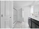 Modern bathroom featuring a shower and double vanity sink at 1095 Bevy Blvd, Danville, IN 46122