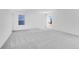 Large bright bedroom featuring two windows and neutral decor at 1095 Bevy Blvd, Danville, IN 46122